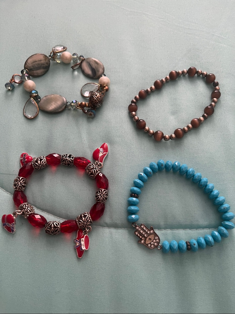 Luxury Accessories - Beaded bracelet’s with charms